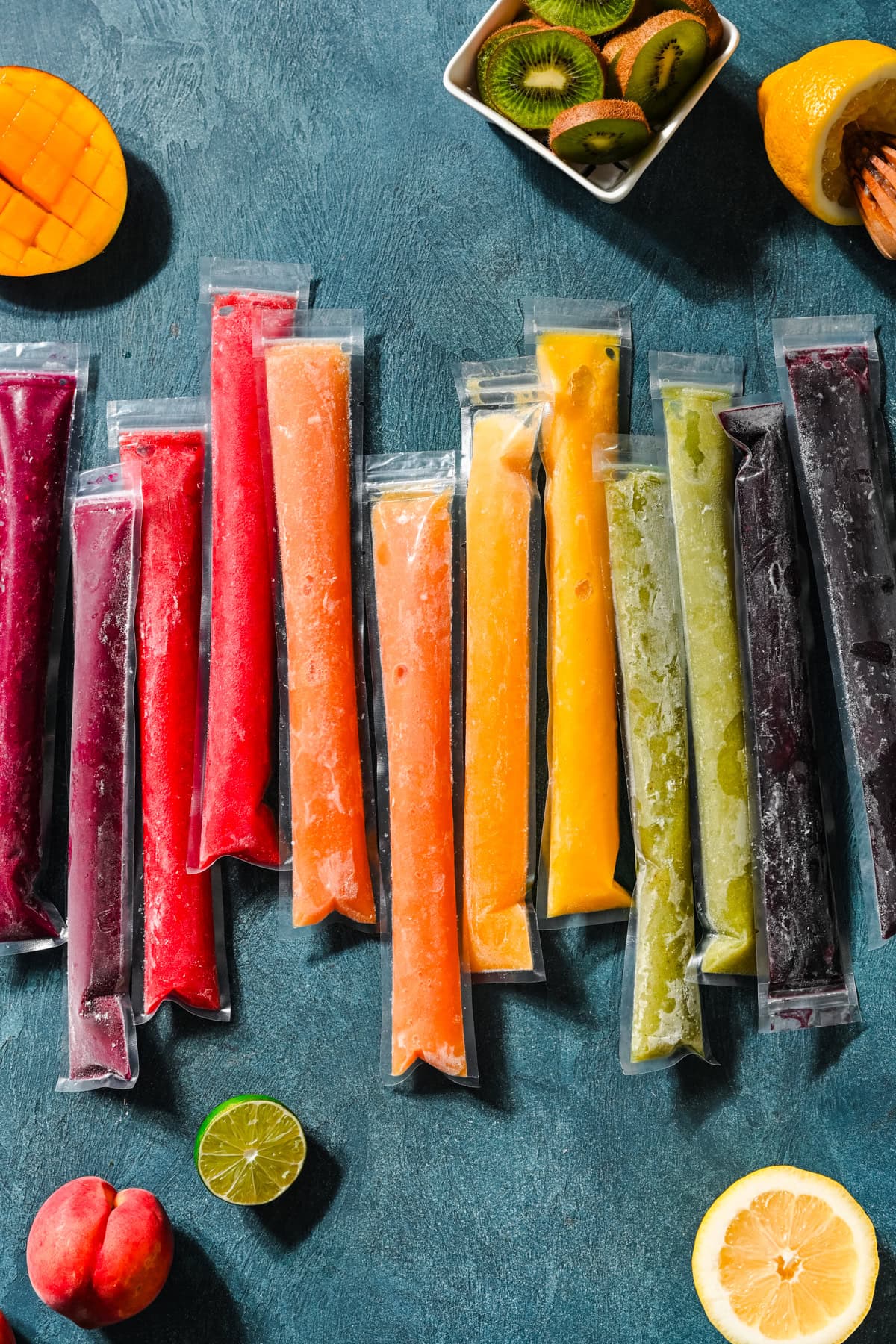 Overhead view of freeze pops surrounded by fruit.