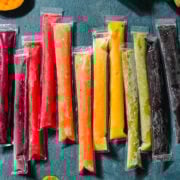 Overhead view of freeze pops surrounded by fruit.