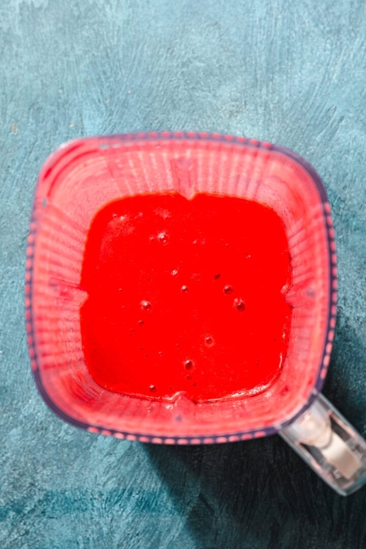 Overhead view of blended strawberries.