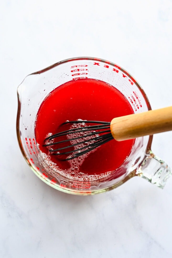 Overhead view of fruit punch ingredients mixed together.
