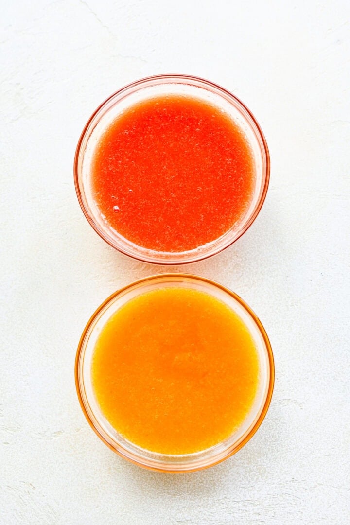 Overhead view of different colored fruit purees.