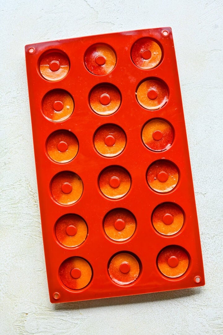 Peach rings in a silicone mold.