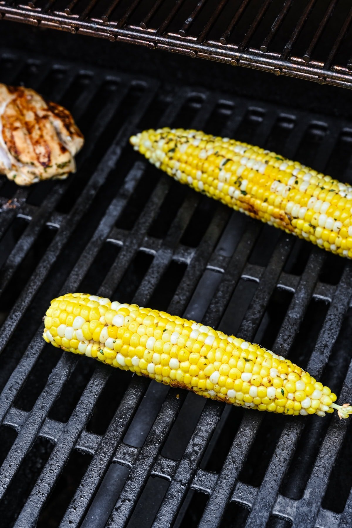 Corn grilling on a grill.