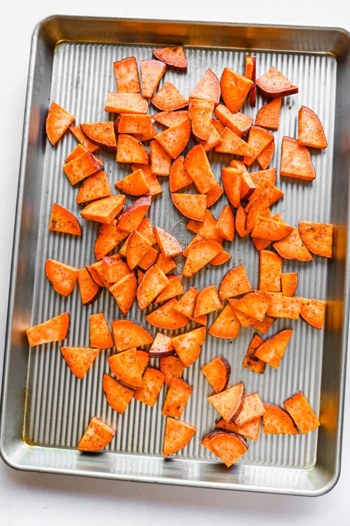 Overhead view of uncooked sweet potatoes.
