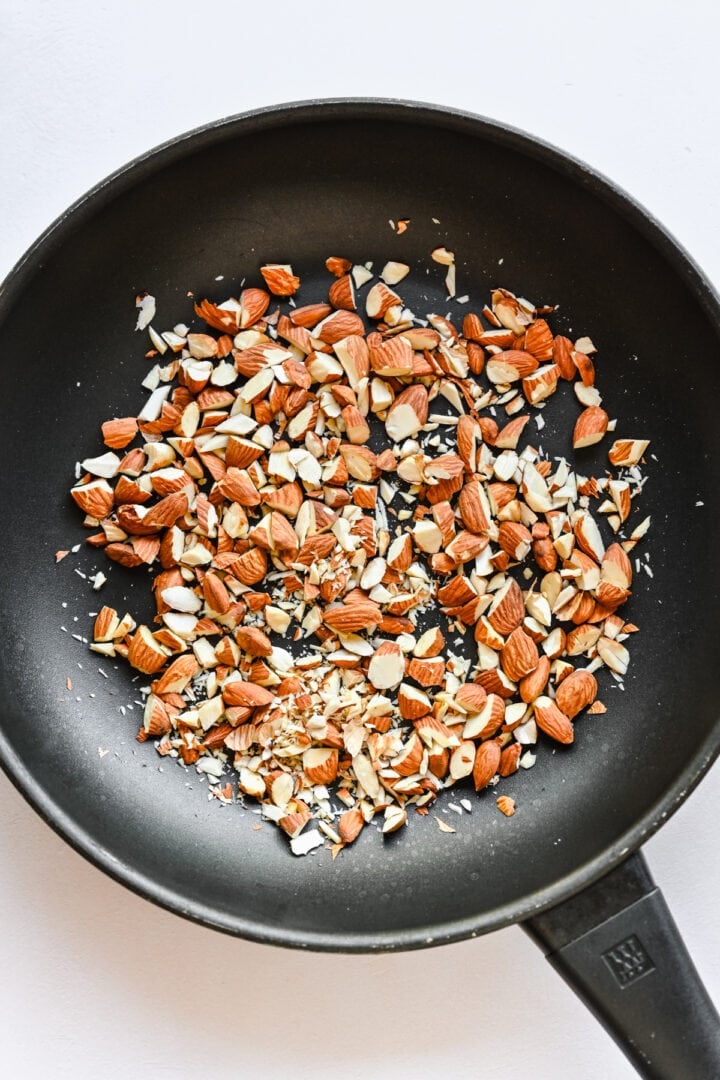 Chopped almonds in a pan.