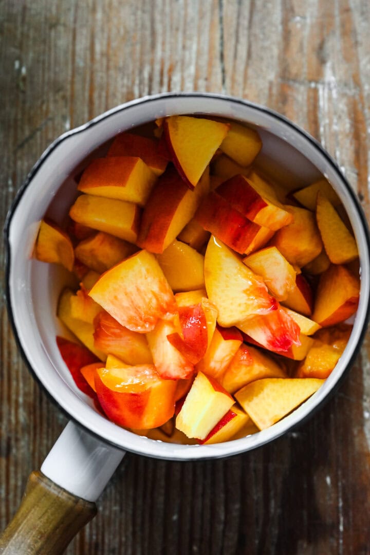 Peach in a saucepan.