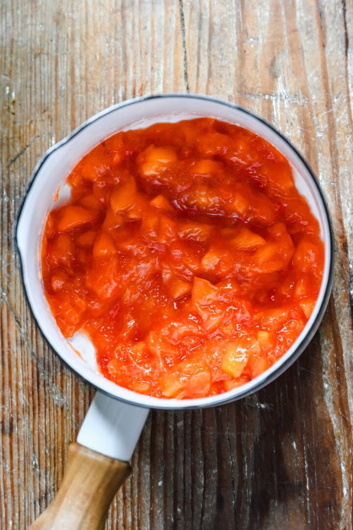 Peach in a saucepan.
