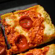 Overhead view of pizza corner with pepperoni.