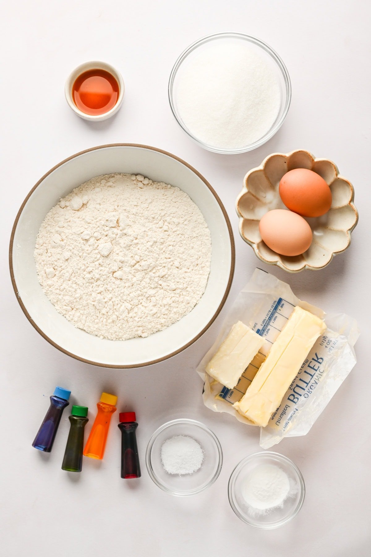 Overhead view of Christmas cookie ingredients, including flour and sugar.