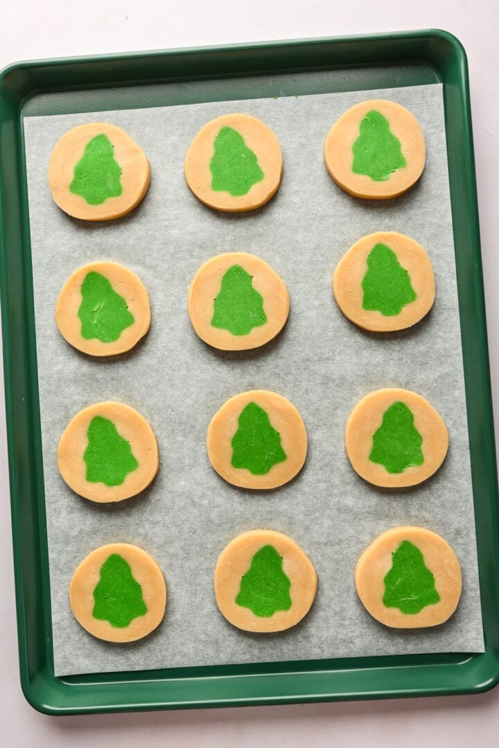 Christmas tree cookies on a sheet pan.