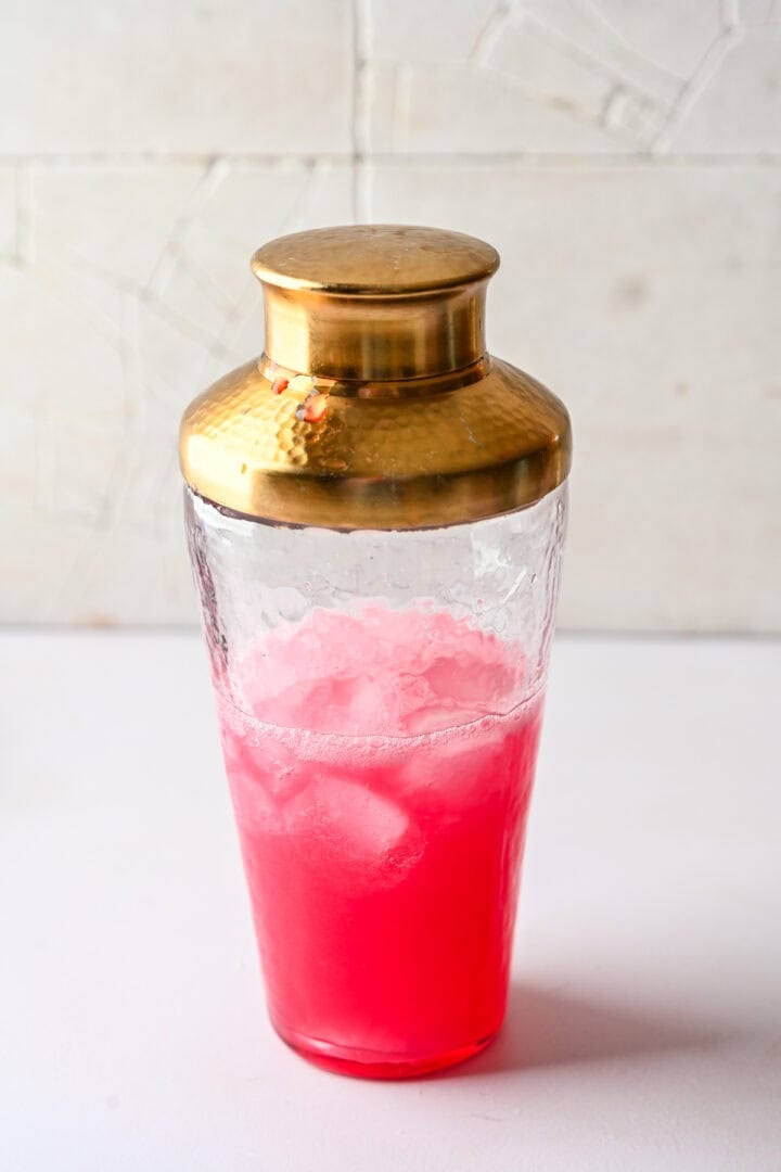 Pink cocktail in a cocktail shaker.