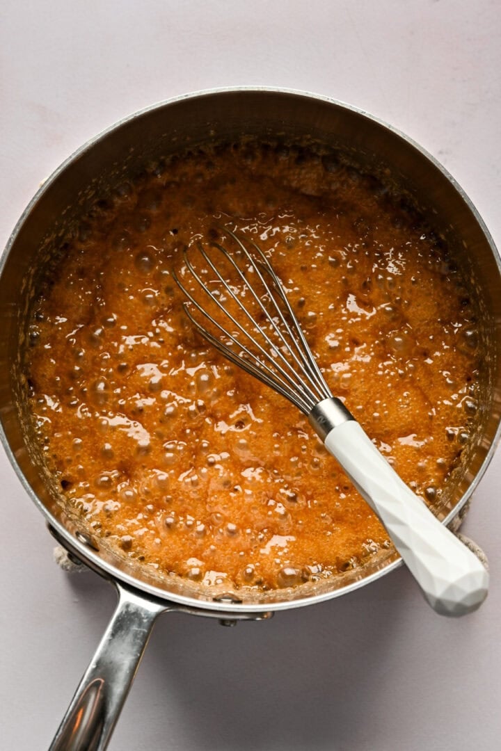 Bourbon caramel in saucepan.