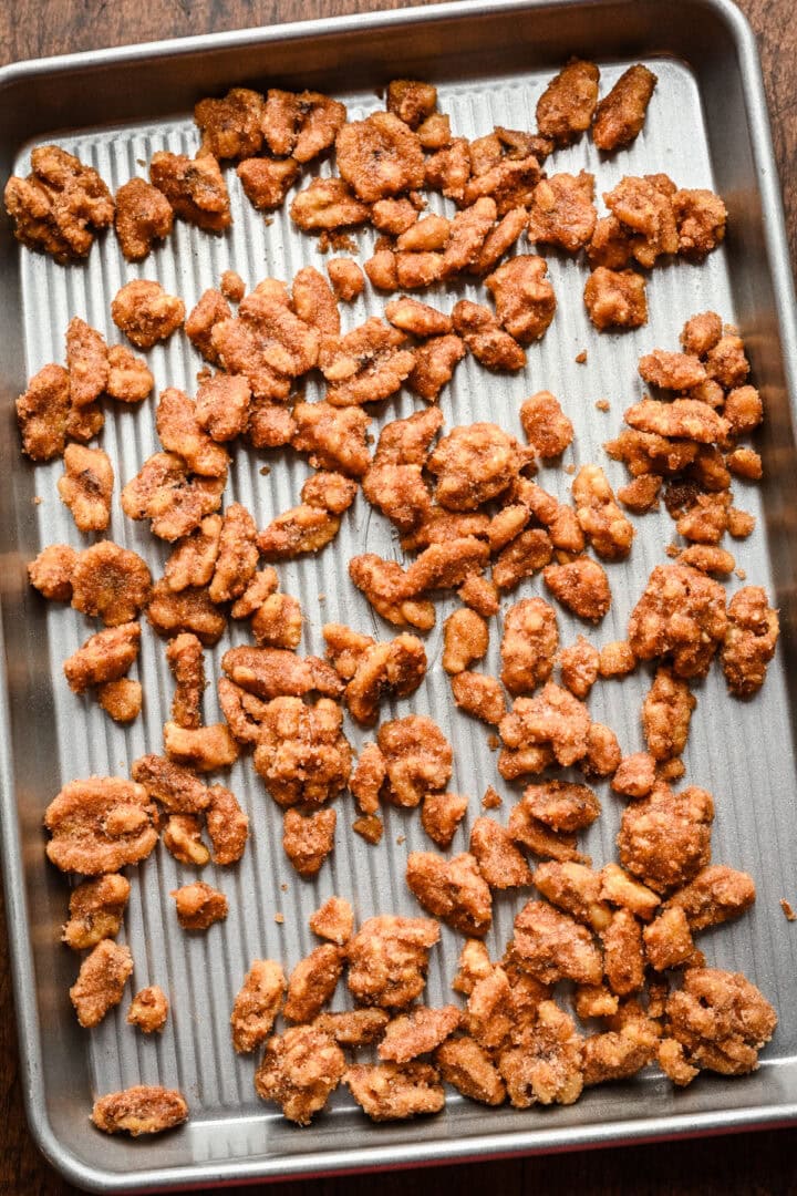Candied walnuts on sheet pan before baking.