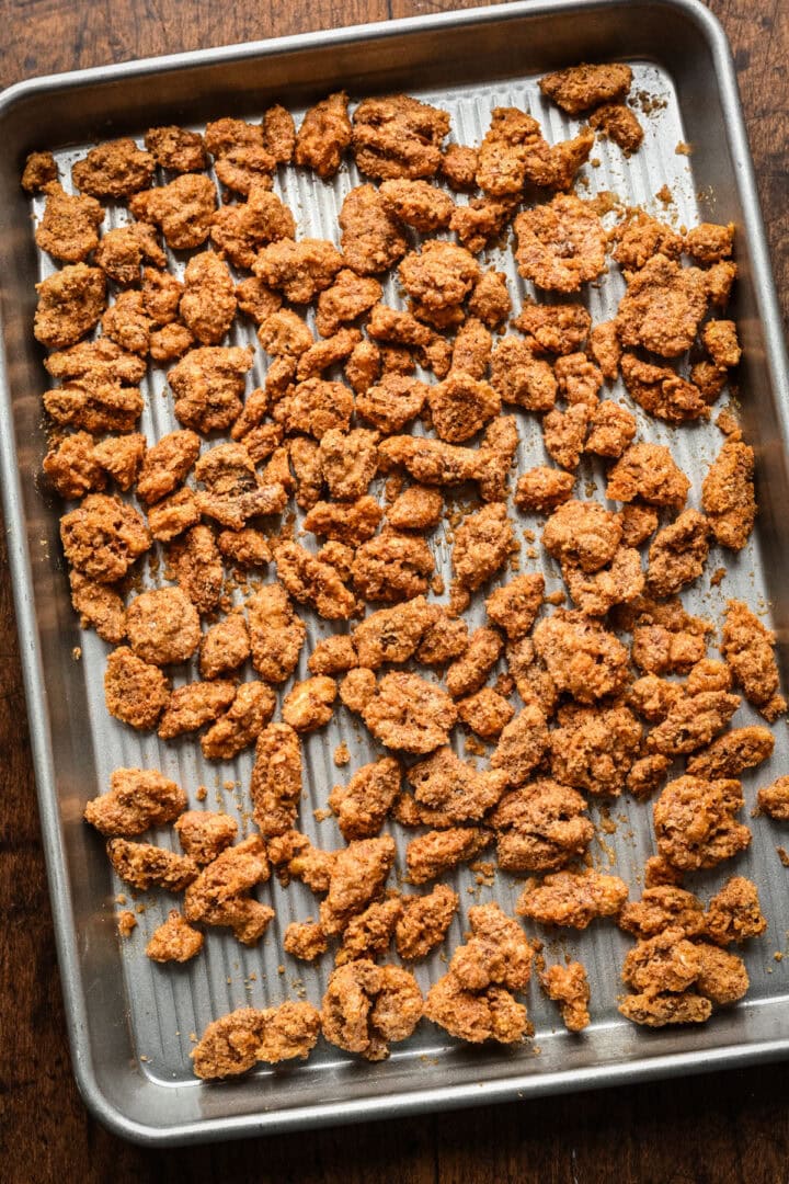 Candied walnuts on sheet pan after baking.