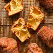 Overhead view of several popovers, some of which are cut in half.