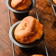 Close up view of one popover in a popover pan.