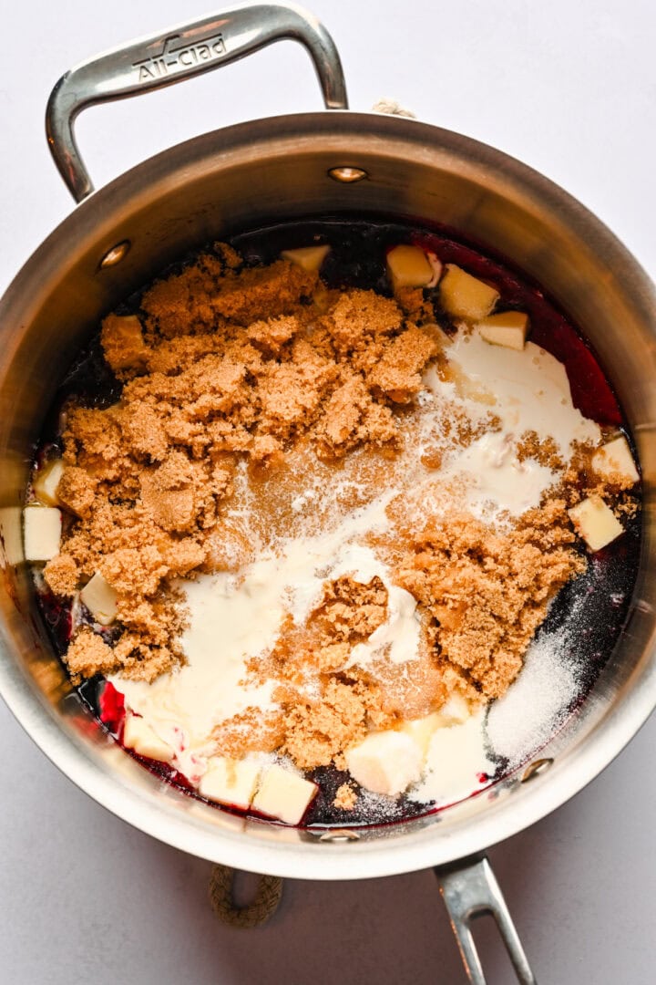 Butter, sugar and other ingredients after adding them to pot with reduced cyrup.