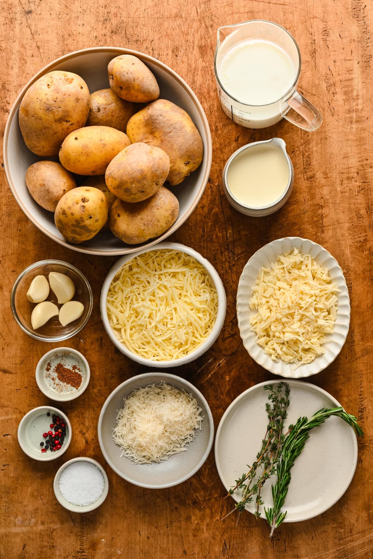 Overhead view of dauphinoise potatoes ingredients.
