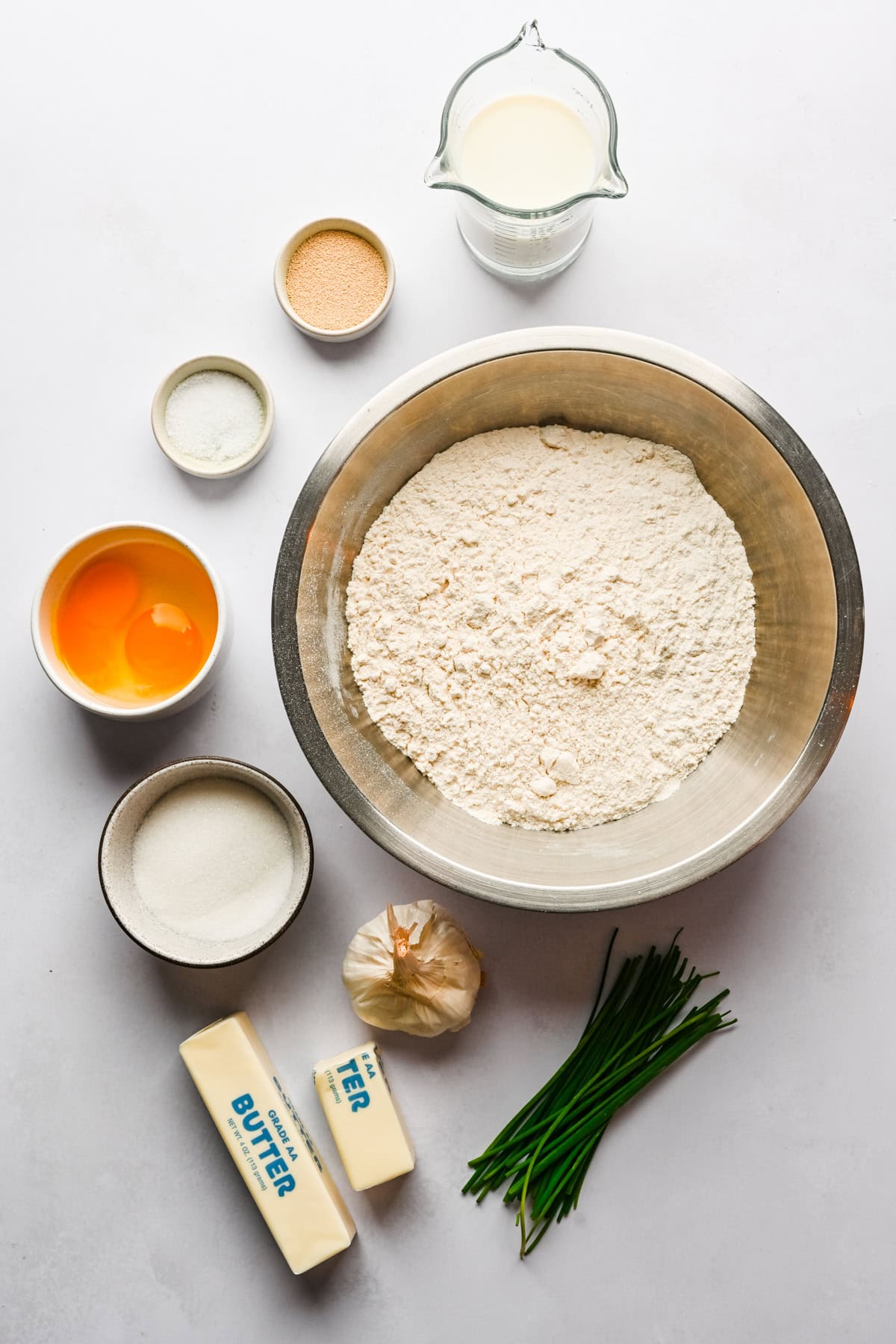 overhead view of ingredients for garlic herb fan rolls.