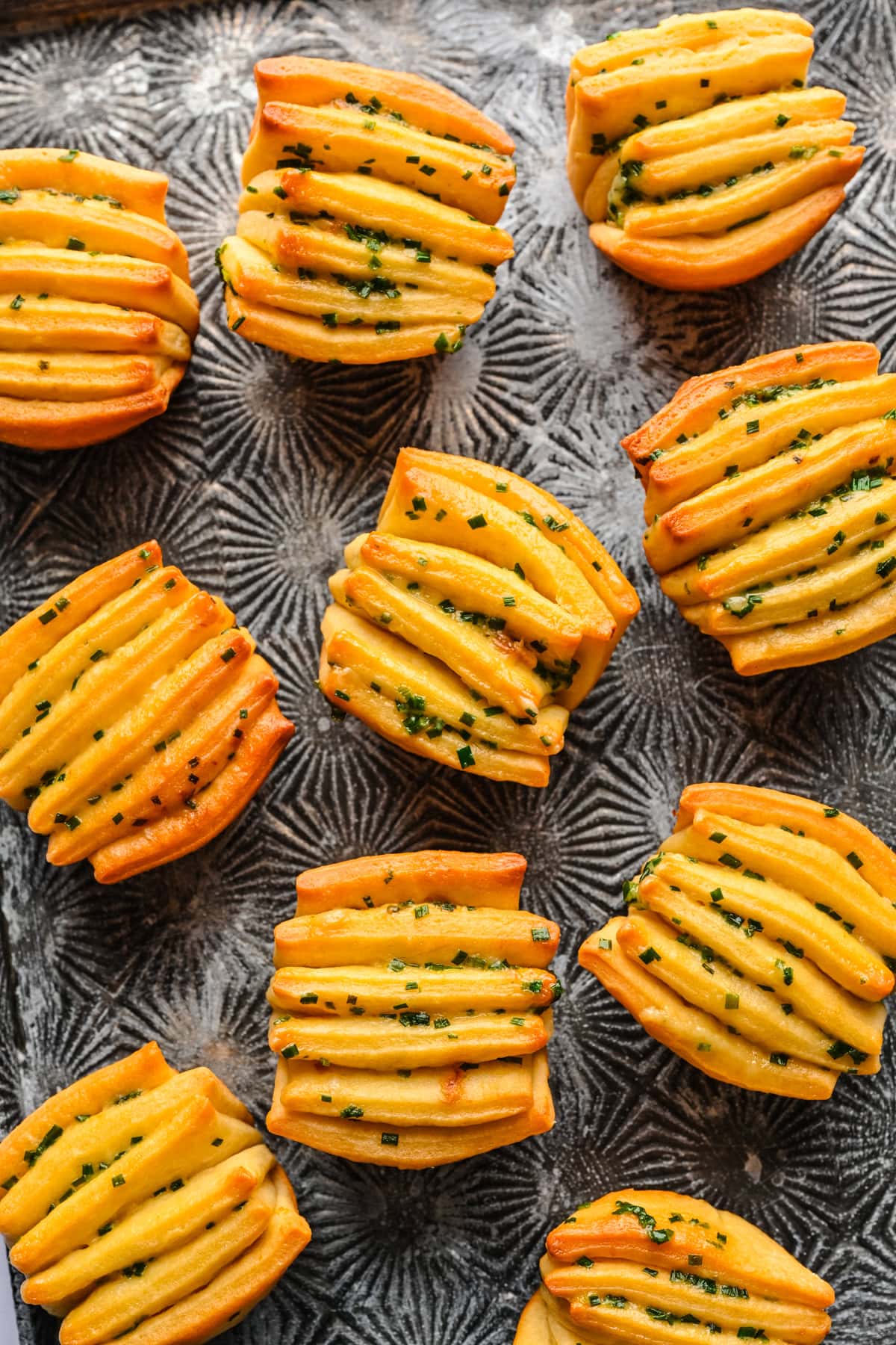 overhead view of garlic herb butter fan rolls.