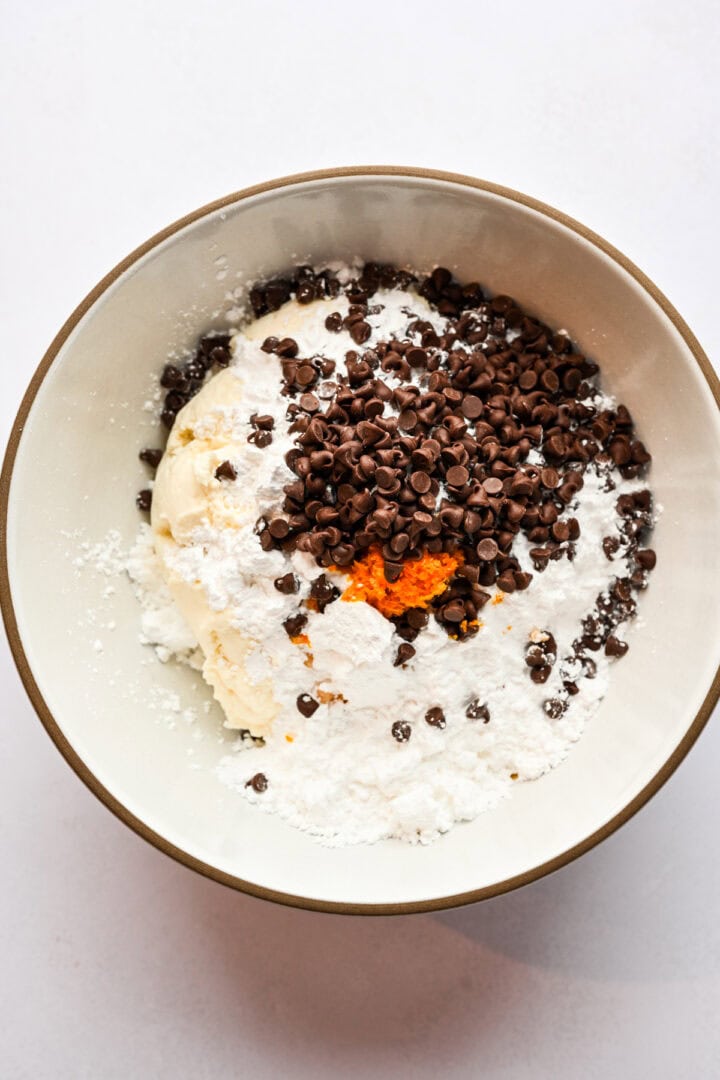 Cannoli filling ingredients before mixing in a bowl.