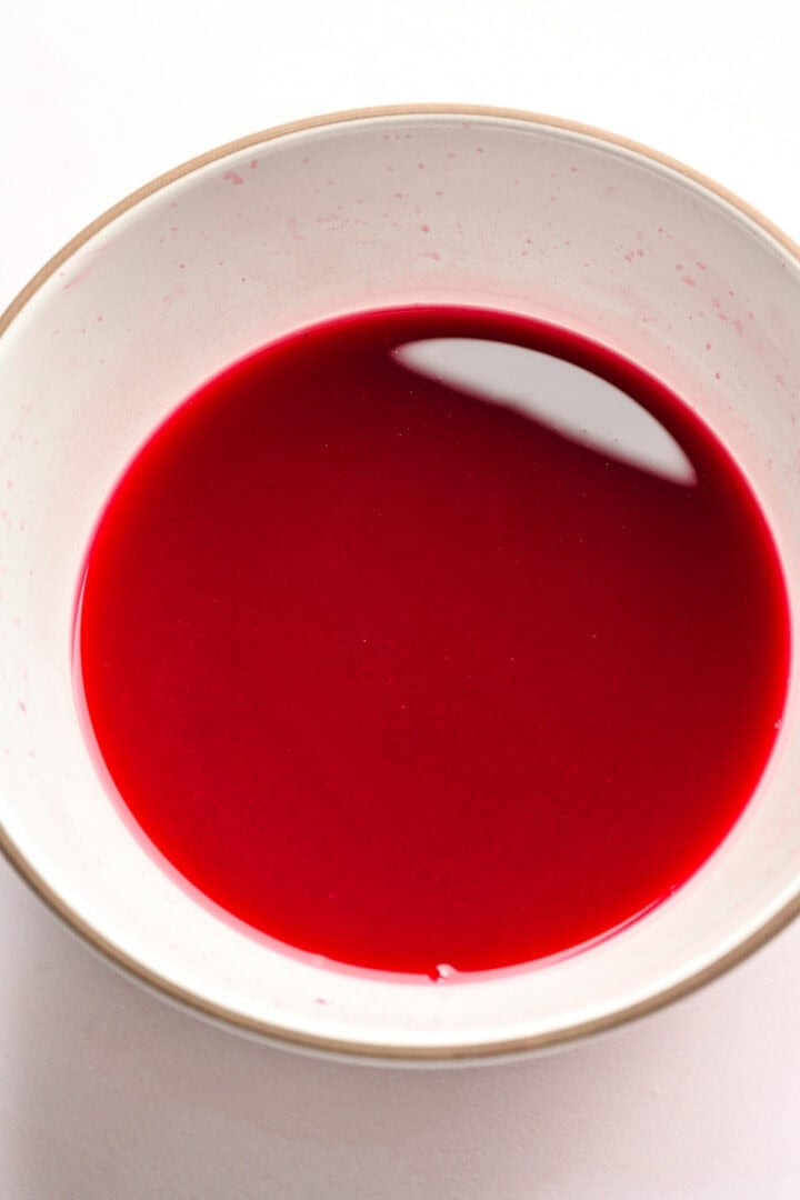 Pomegranate juice in a bowl.