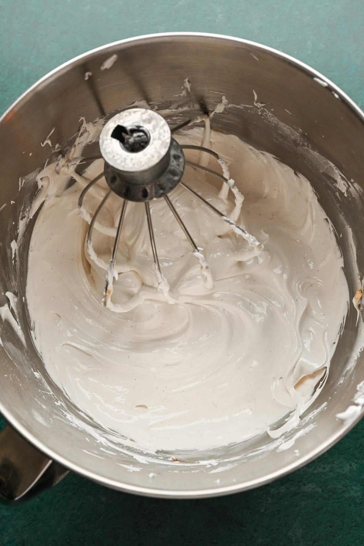 Meringue mixture in mixing bowl.