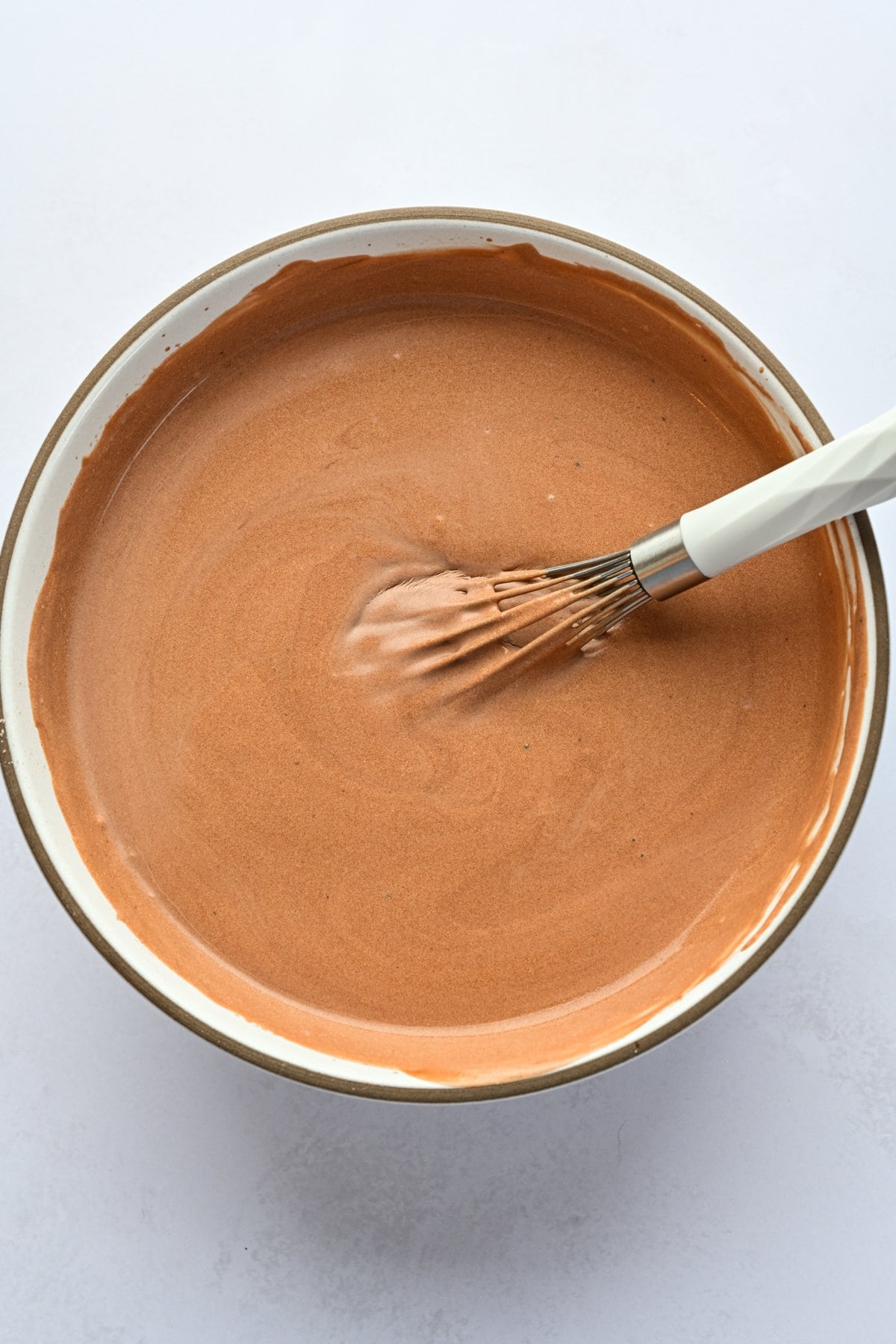 Overhead view of Peppermint Espresso martini pudding shot mixture in bowl. 