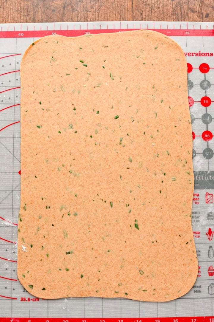 Dough rolled into a thin rectangle.