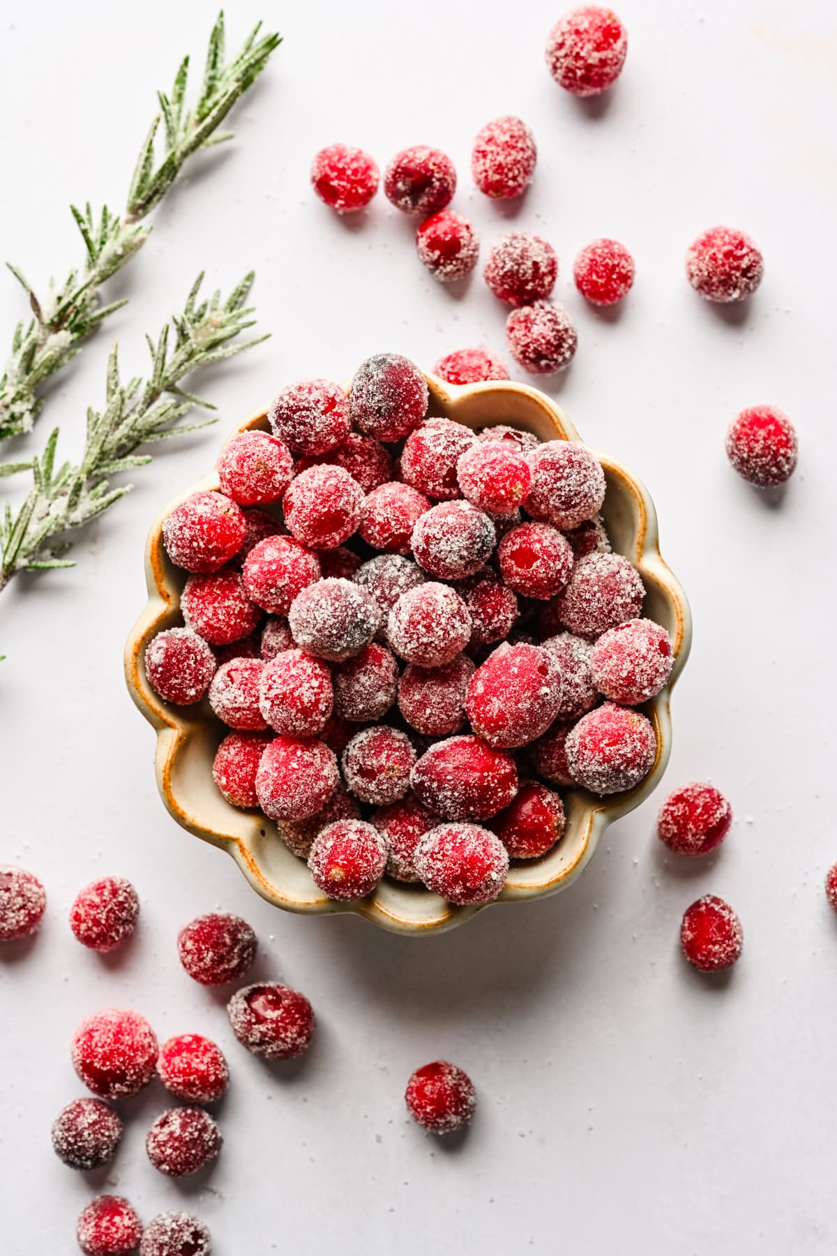Sugared cranberries in a bowl.