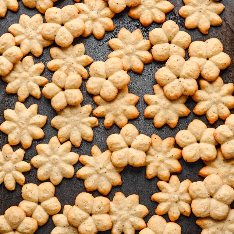 Crispy flower-shaped cookies, homemade snack, buttery and savory flavor.