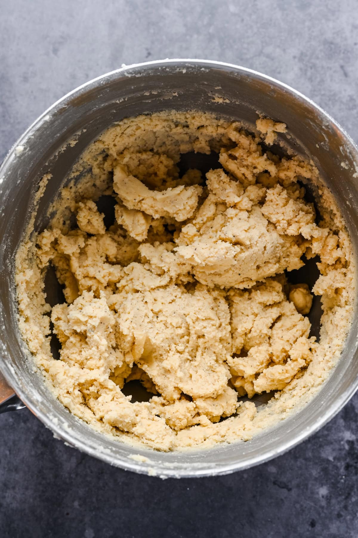 White Cheddar Spritz cracker dough before adding flour in mixing bowl. 