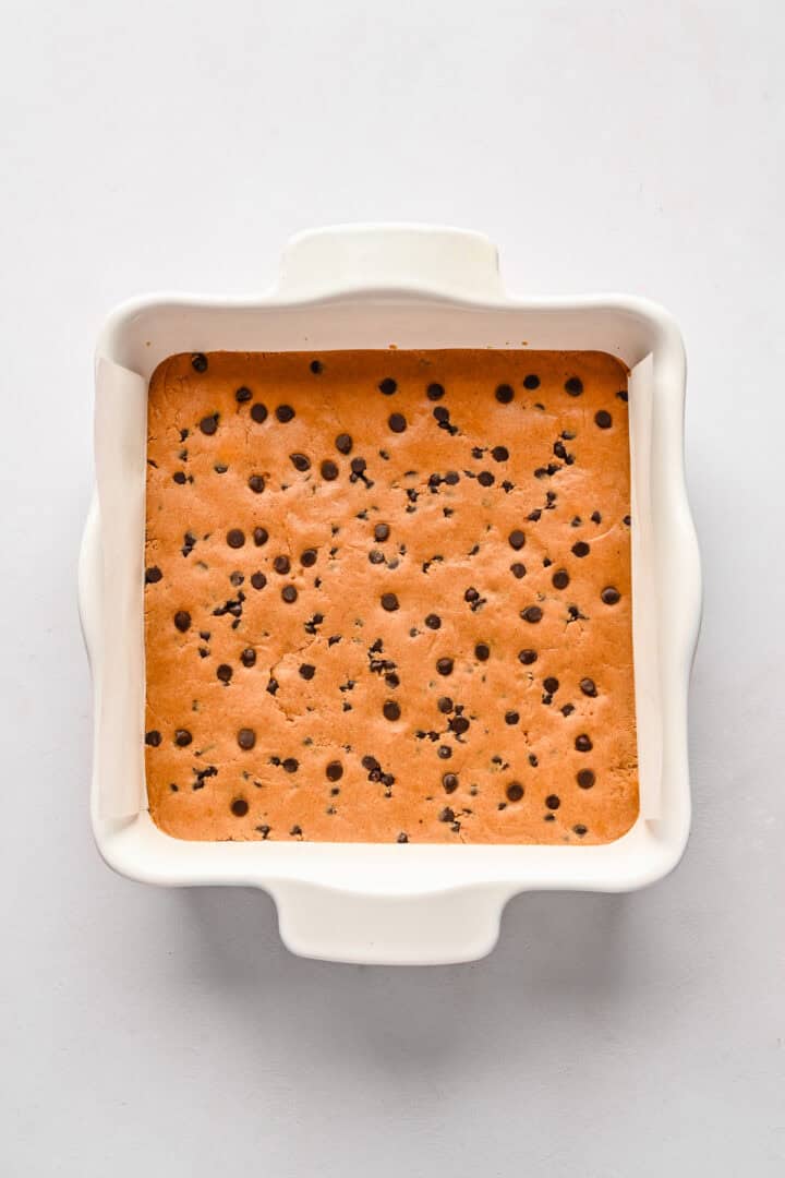 Protein bars in an 8x8 pan seen from overhead.