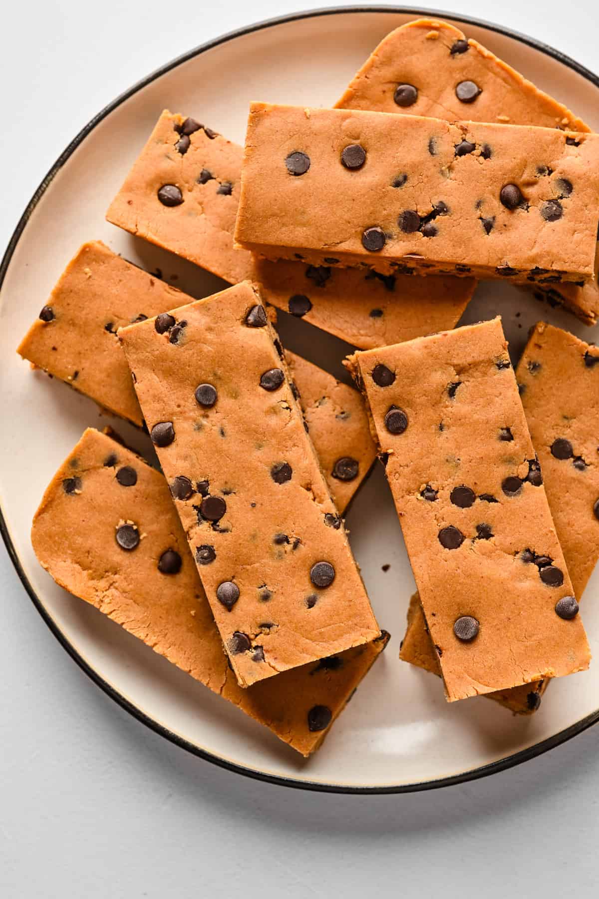 Overhead view of protein bars on a plate.