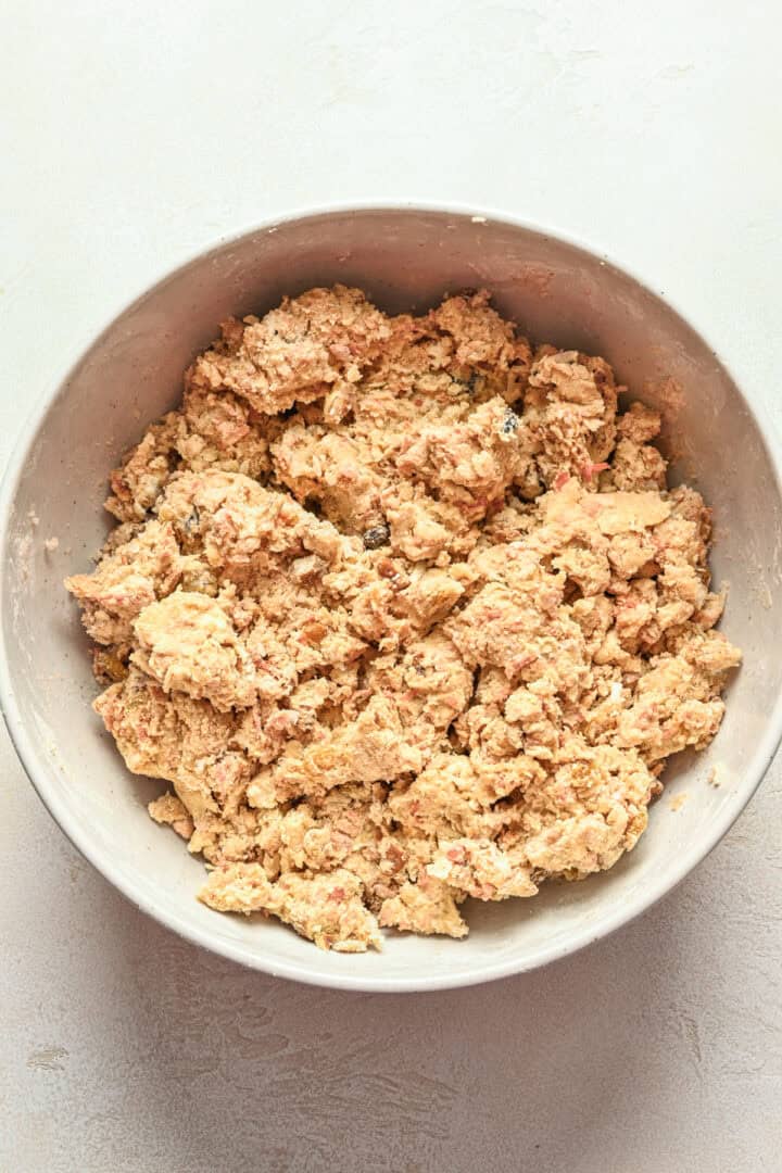 Carrot cake scone dough in a bowl.