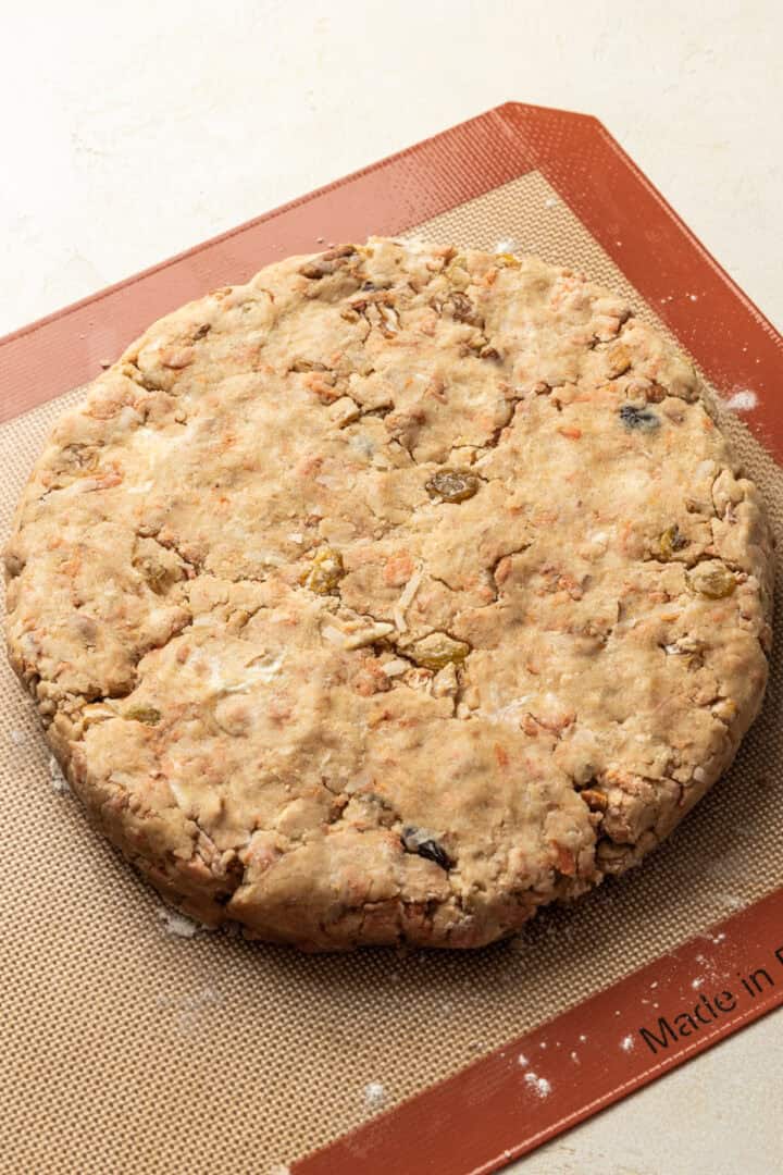 Scone dough in a circle on baking sheet. 
