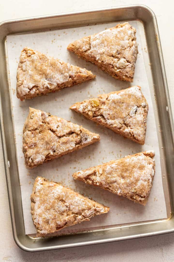 Carrot cake scones on baking sheet before baking.