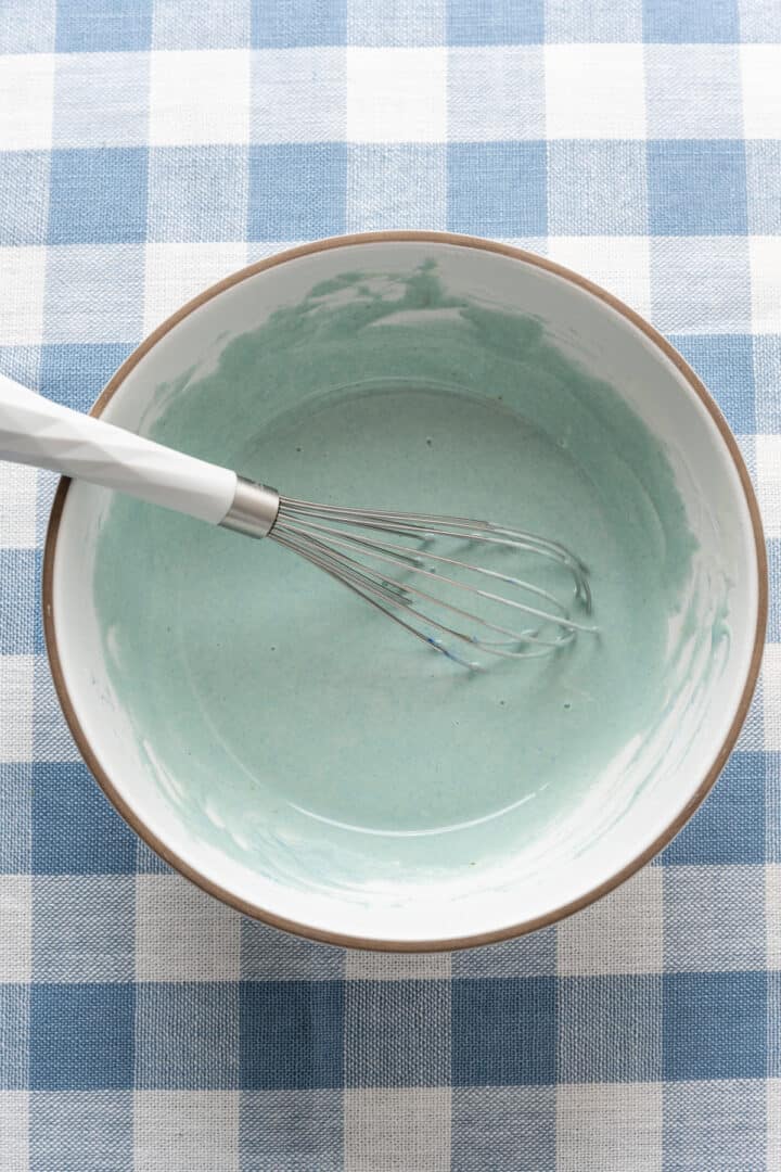 light blue dyed white chocolate in a bowl.