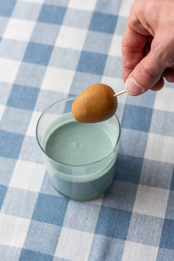 peanut butter egg before dipping in blue white chocolate.