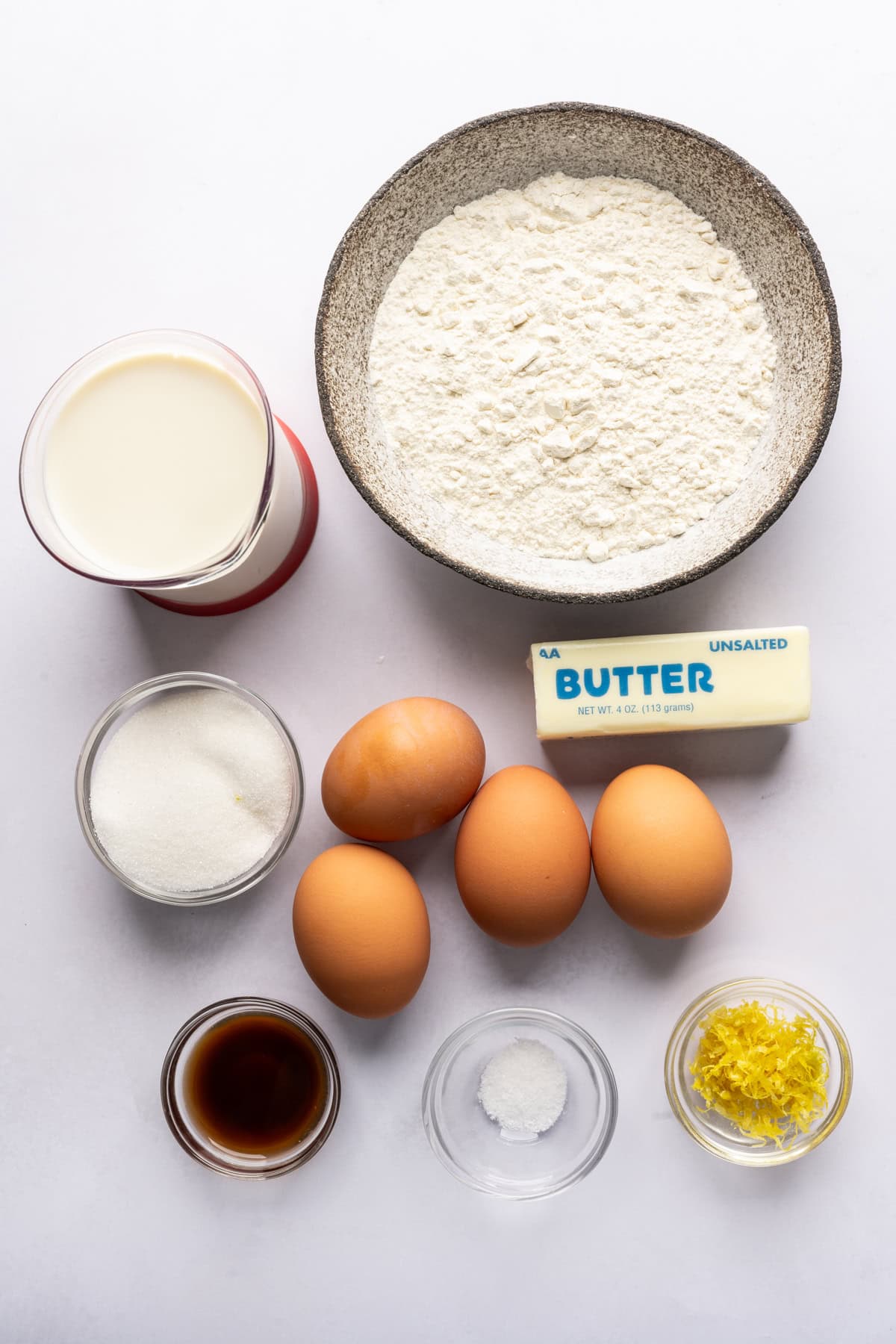 Overhead view of ingredients needed for a dutch baby pancake.
