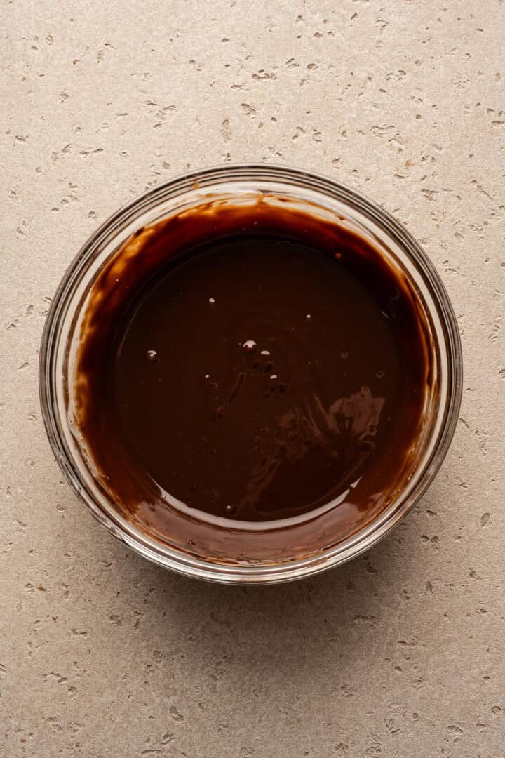 Chocolate ganache in a small mixing bowl.