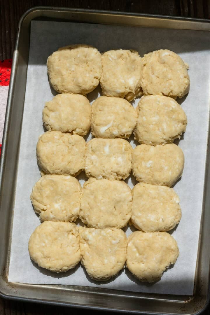 Biscuit base on a sheet pan before baking. 