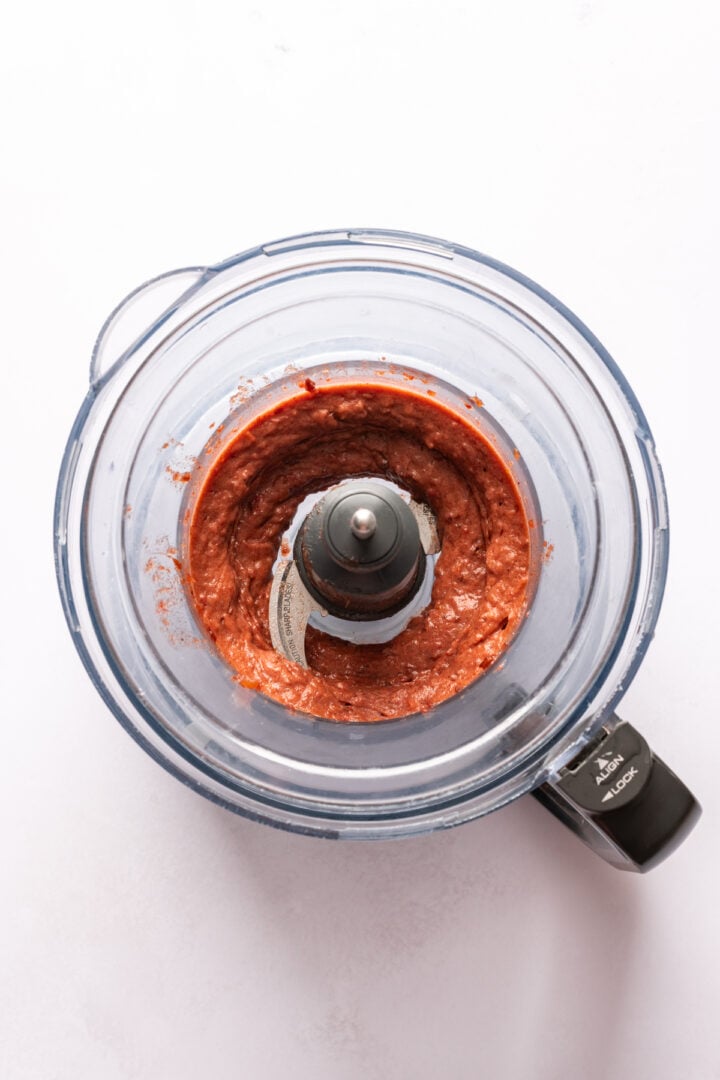 Strawberry date filling mixture pureed in a food processor.