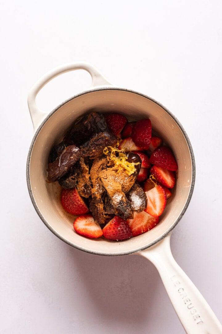 Strawberry date filling mixture in saucepan before cooking. 
