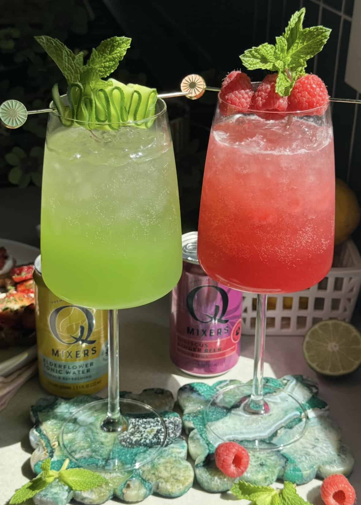 2 colorful spritzes with Q mixers cans. 
