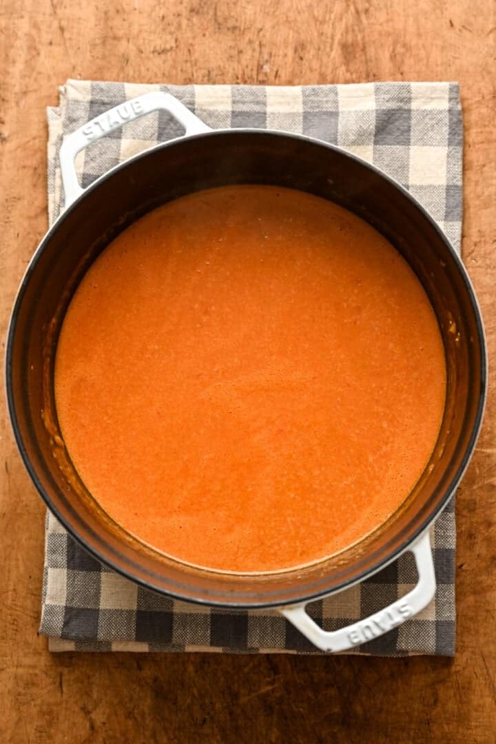 Pureed buffalo chicken chili broth in pot. 