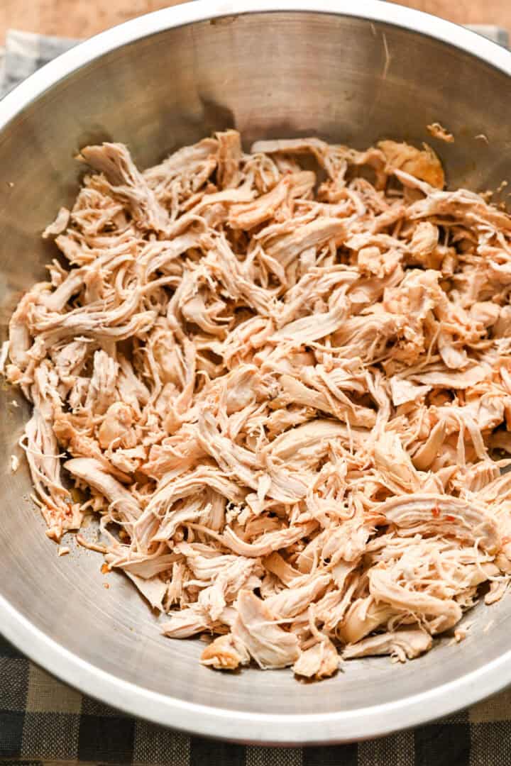 Shredded chicken in a bowl. 