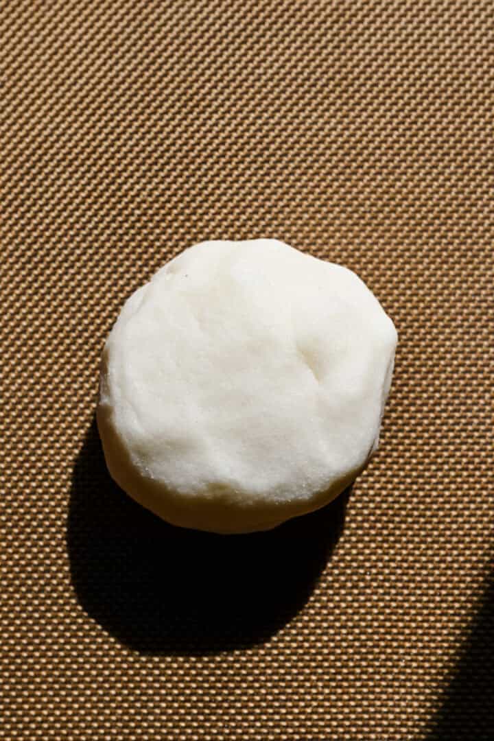 Rice cracker dough formed into a ball.