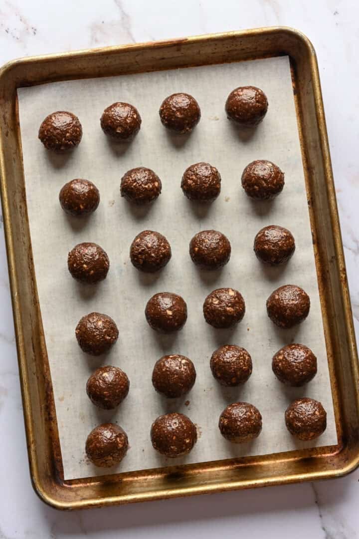 Ferrero rocher truffles before adding the chocolate coating on a sheet pan.