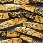 Overhead view of biscotti set atop a sheet pan.